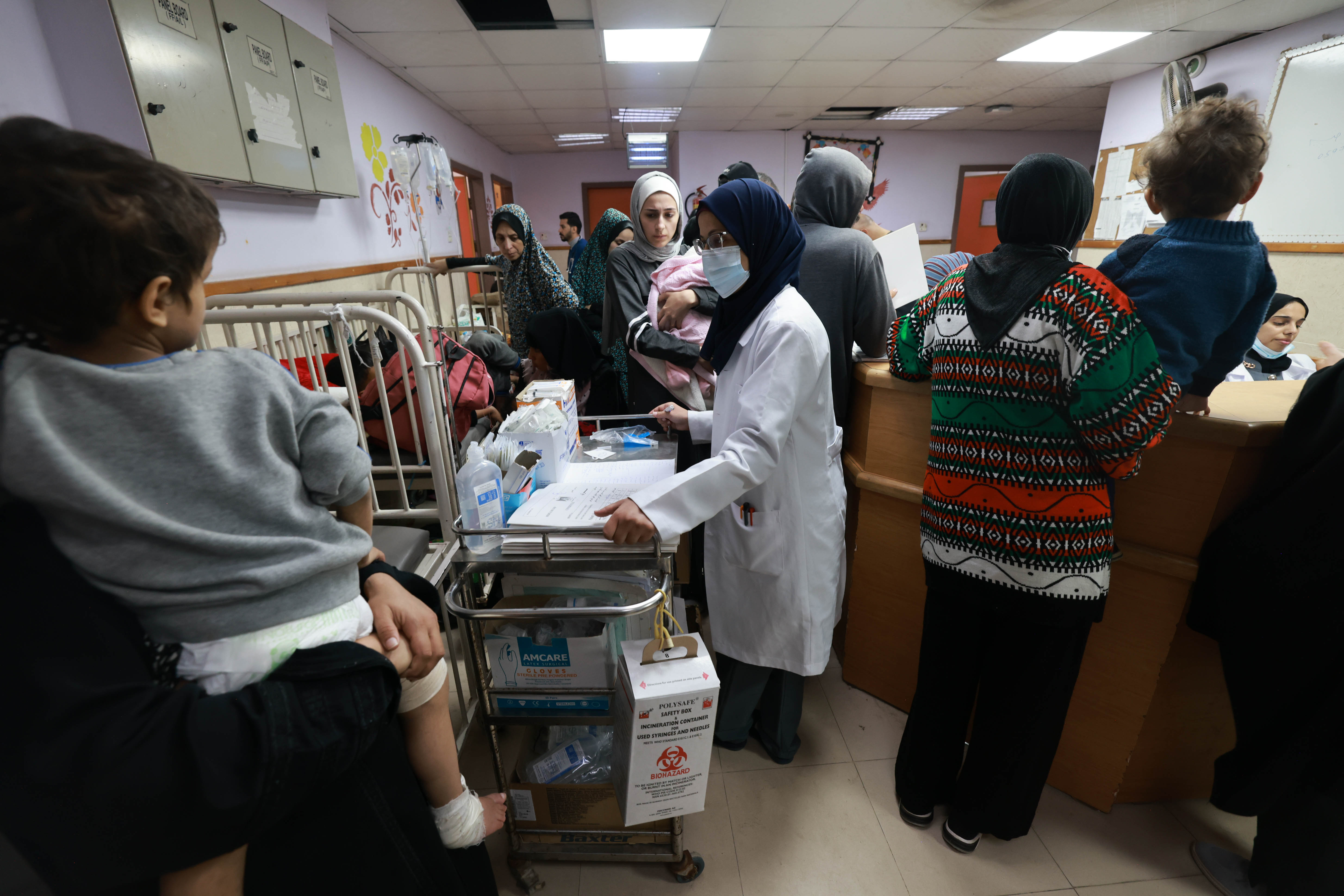 Patients and people sheltering in Al Aqsa hospital