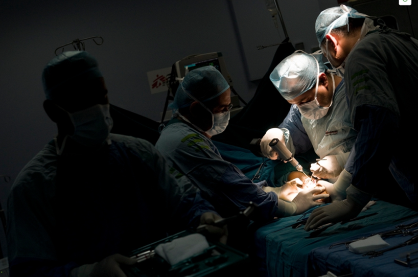 Dr Rasheed performing a surgical operation