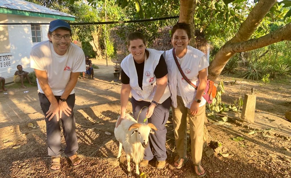 Jochen, the project medical referent (left), Candice, the microbiologist and Maria, the deputy project medical referent (right) with the sheep.