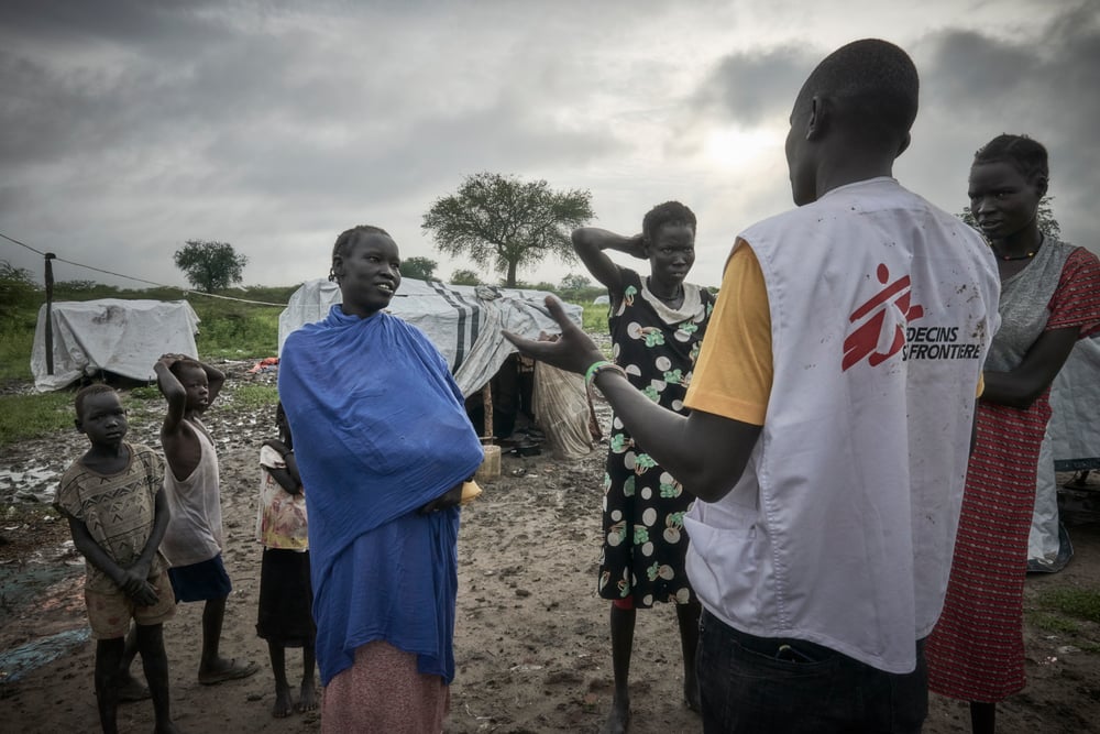 Noon Makor, speaks with the residents of the IDP camp