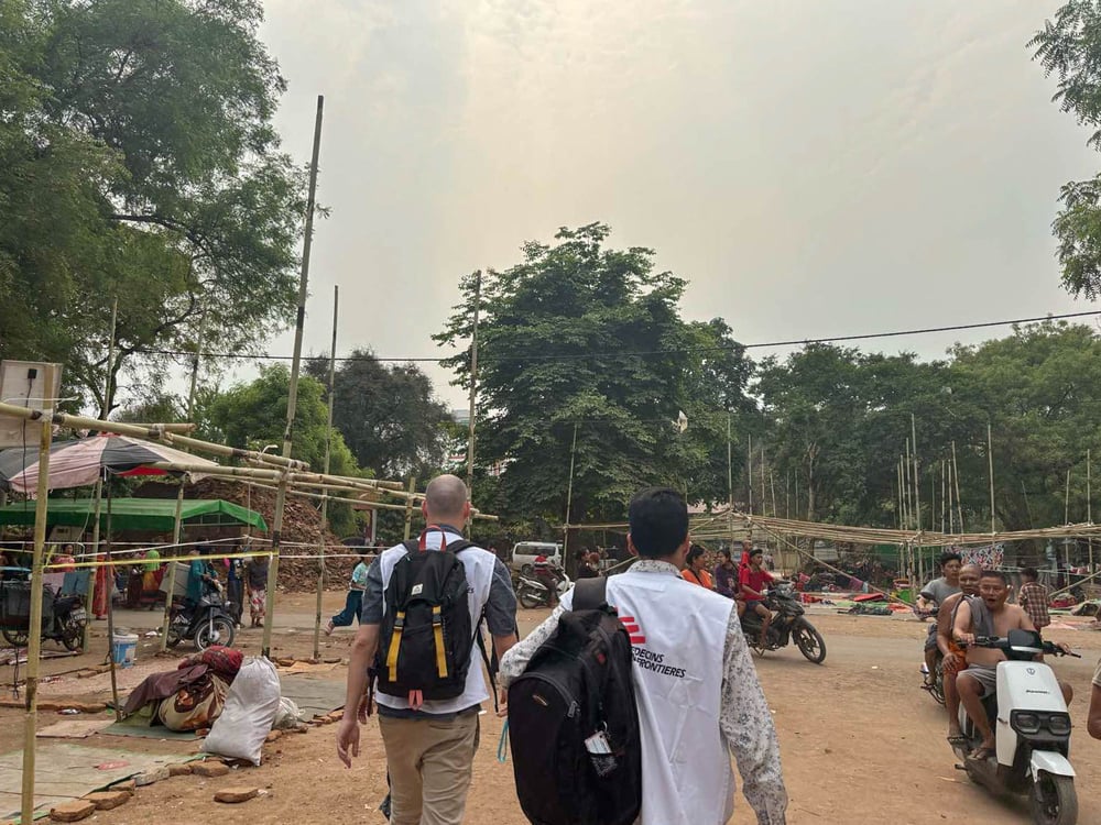 MSF  team members in the temporary camp in Chan Mya Thar Si Township, Mandalay, during a visit to provide psychological first aid via a mobile clinic.  © MSF