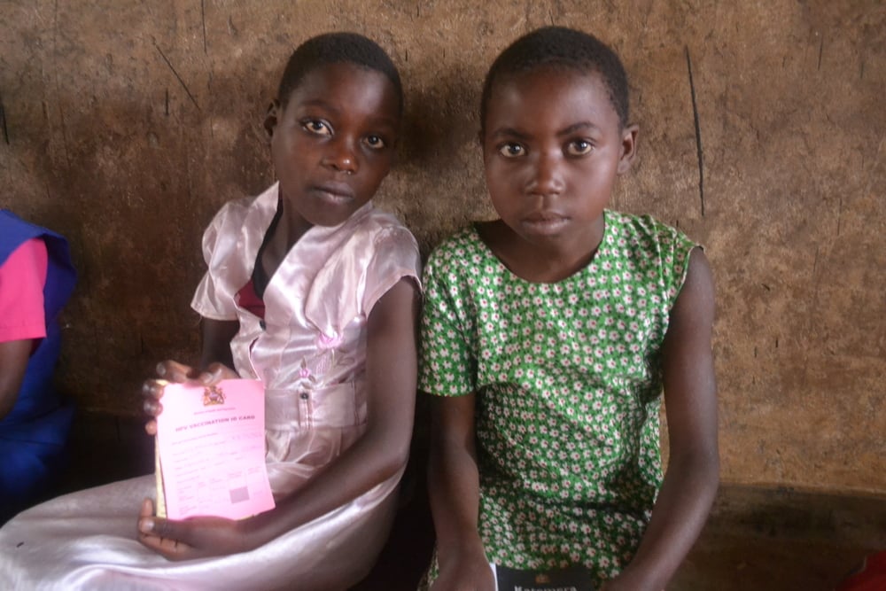 Young girls with their vaccination report card, kept as a record of their HPV vaccination today in Lisawo Primary School, Chiradzulu District, Malawi. © MSF